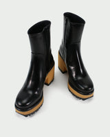 Homers Stiefeletten Absatz